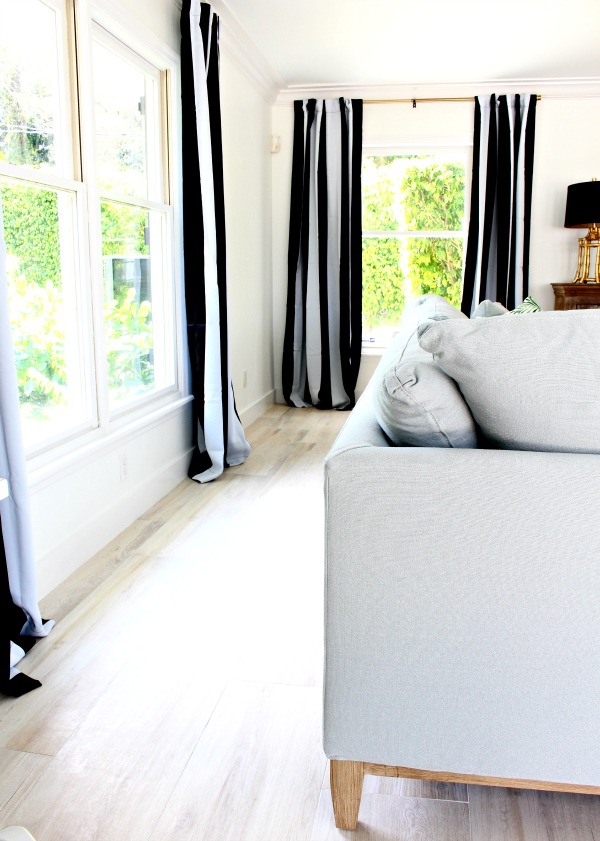 modern-beach-cottage-makeover-family-room-black-white-stripe-curtains