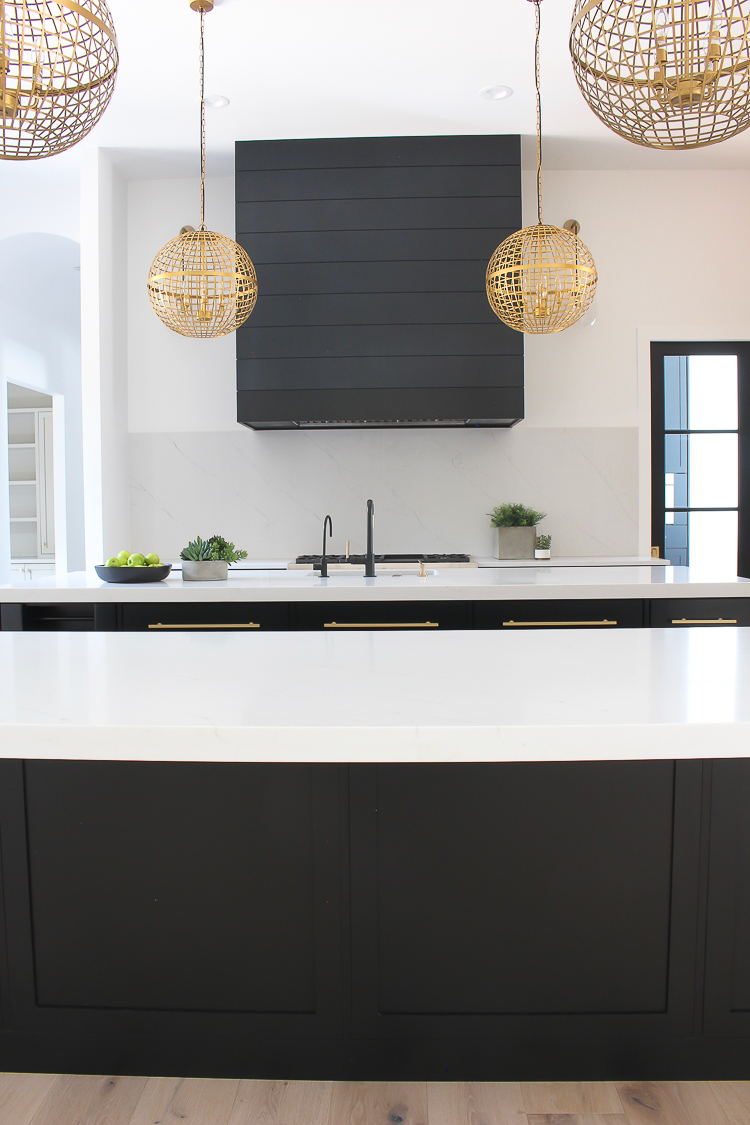 black shiplap hood in modern kitchen