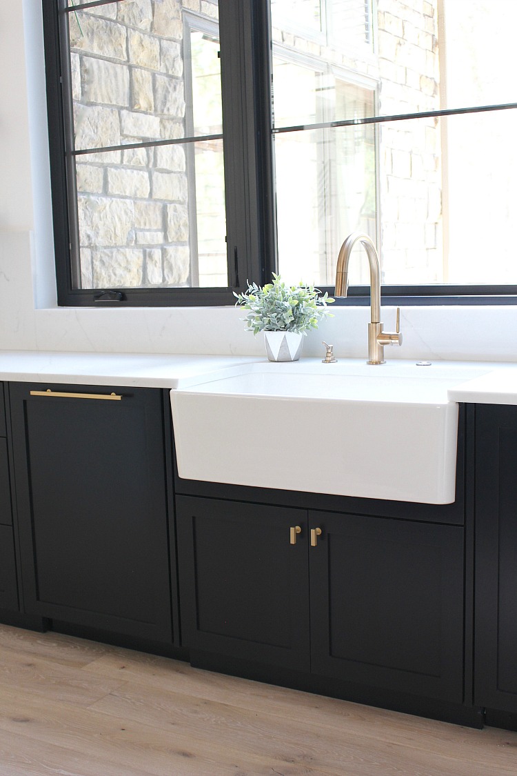 modern kitchen black cabinets open shelves white farm sink