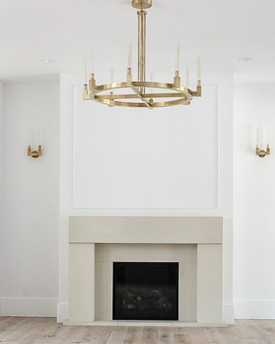 The Forest Modern Living Room Featuring a Gorgeous Cast Stone Limestone Mantel