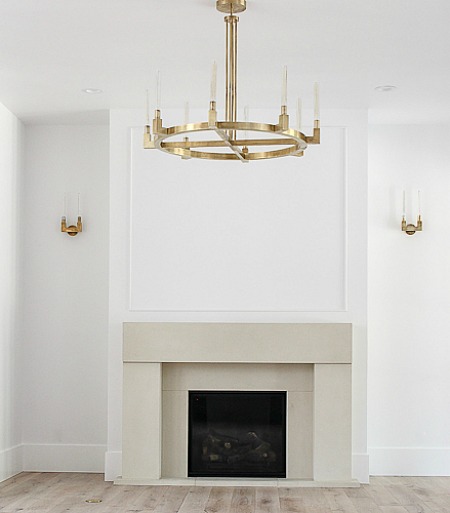 The Forest Modern Living Room Featuring a Gorgeous Cast Stone Limestone Mantel