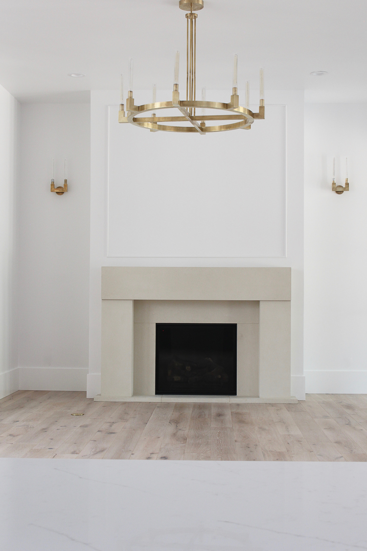 Modern Living Room featuring cast stone limestone mantel