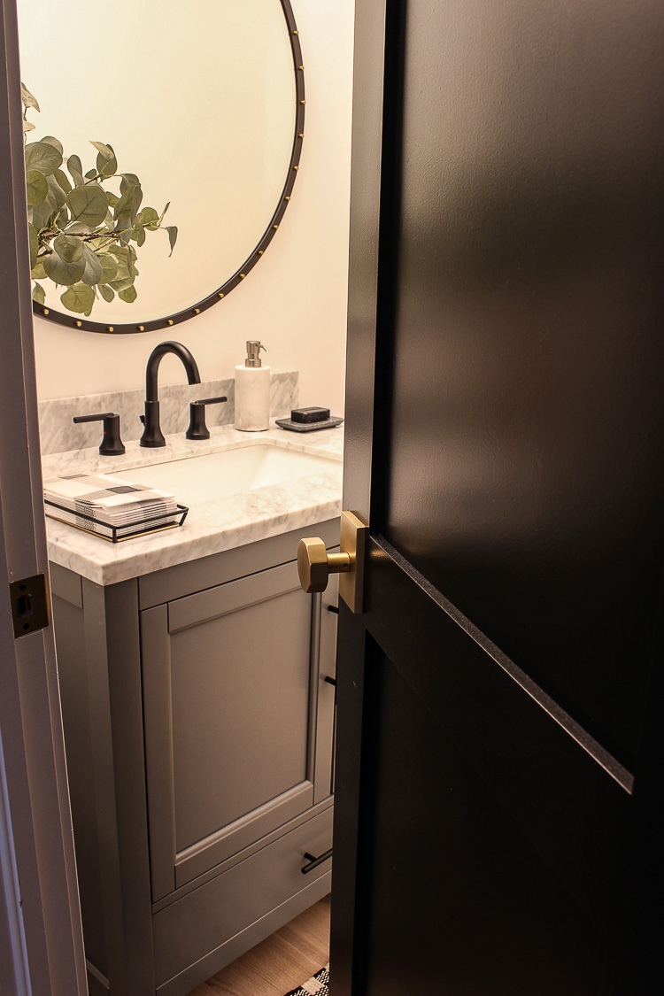 transitional-modern-powder-bathroom-black-door