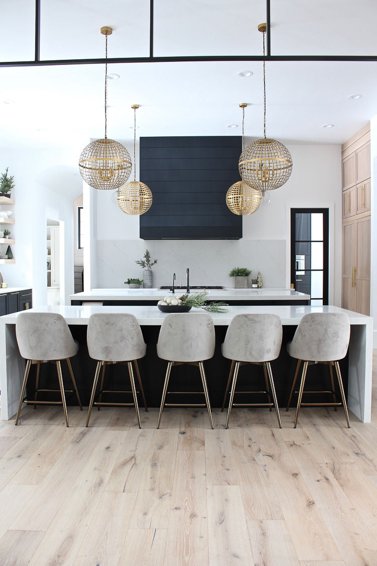 christmas-decorations-modern-kitchen-rift-sawn-white-oak-black-cabinets-black-shiplap-hood-steel-transoms