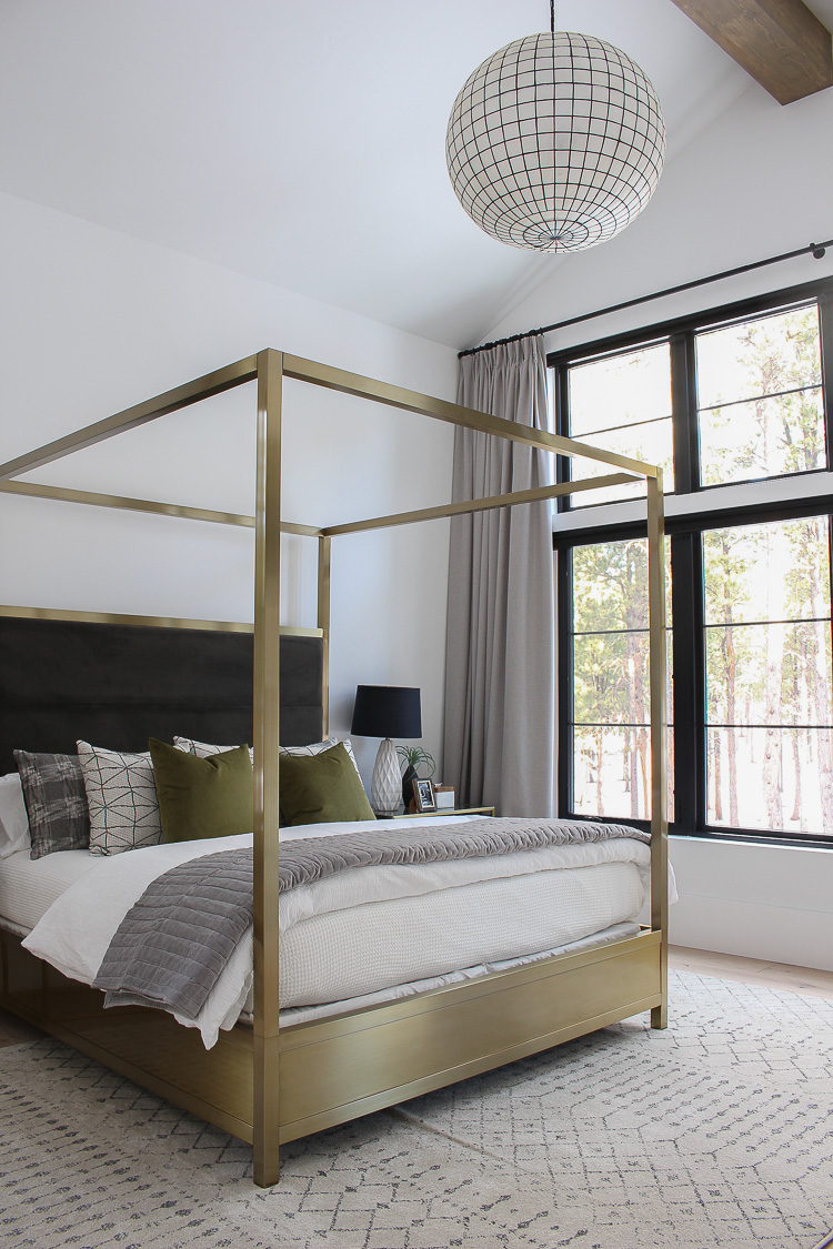 modern-scandinavian-master-bedroom-design-brass-canopy-bed