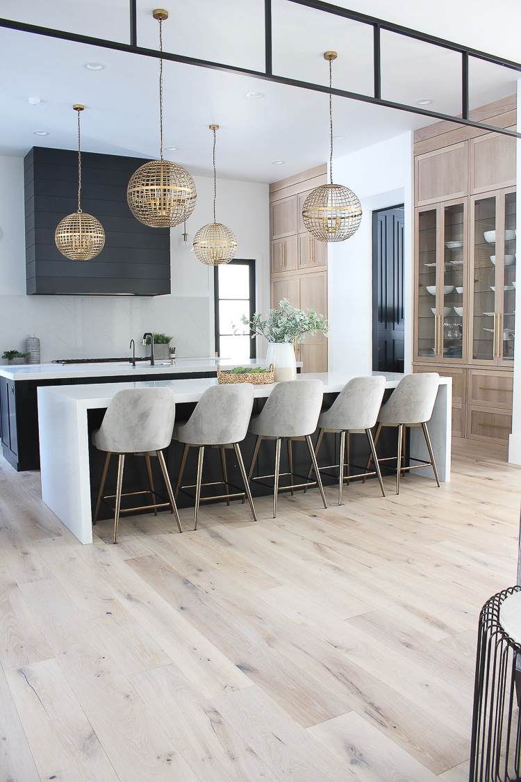 Coffee Mug In Modern Trendy Kitchen With Grey Cupboards And Wood