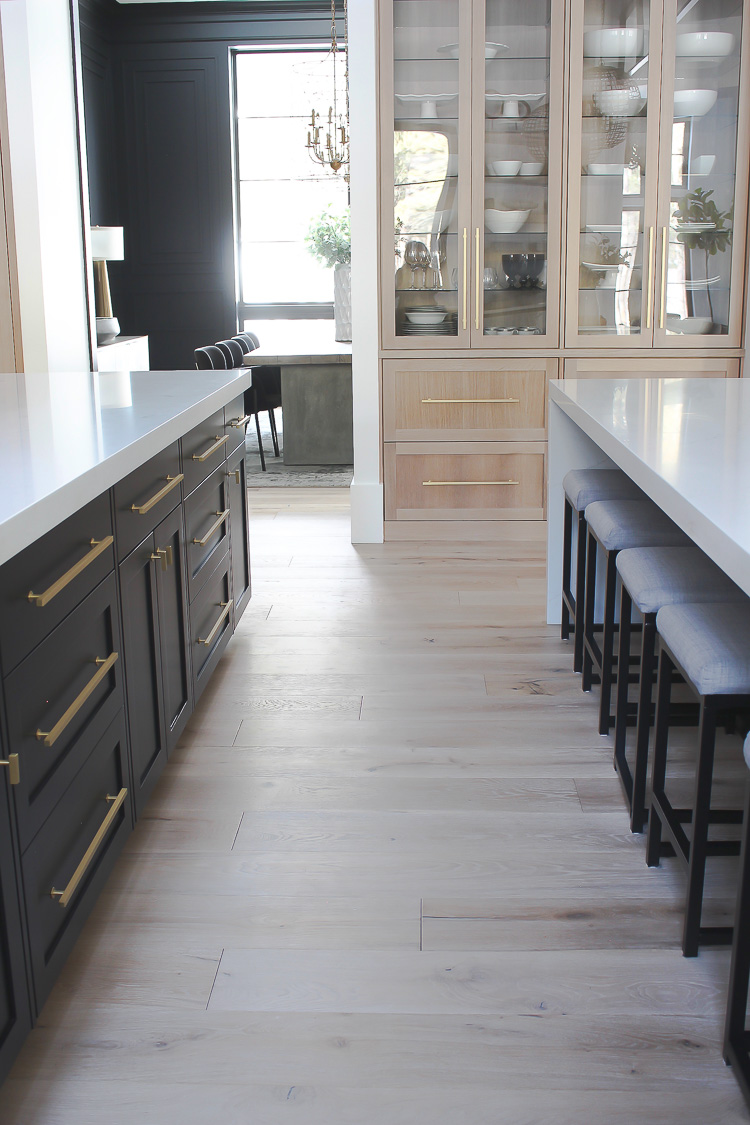 White Upper Cabinets and Gray Lower Cabinets with Gray Kitchen Island -  Transitional - Kitchen