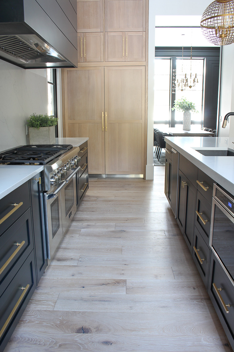 Coffee Mug In Modern Trendy Kitchen With Grey Cupboards And Wood