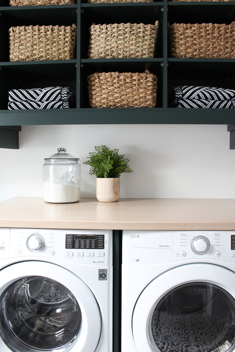 The Laundry/Dog Room: Dark Green Cabinets Layered On Classic Black