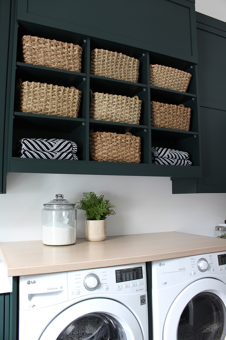 The Laundry/Dog Room: Dark Green Cabinets Layered On Classic Black