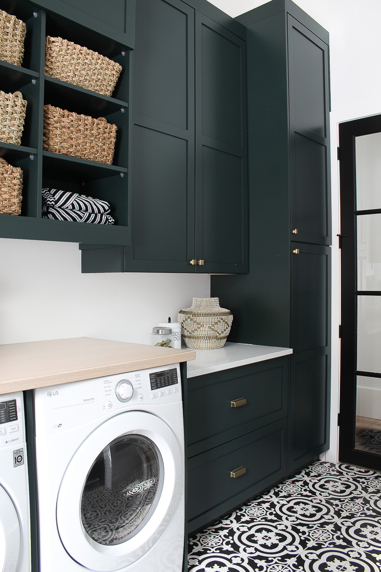 The Laundry Dog Room Dark Green Cabinets Layered On Classic Black