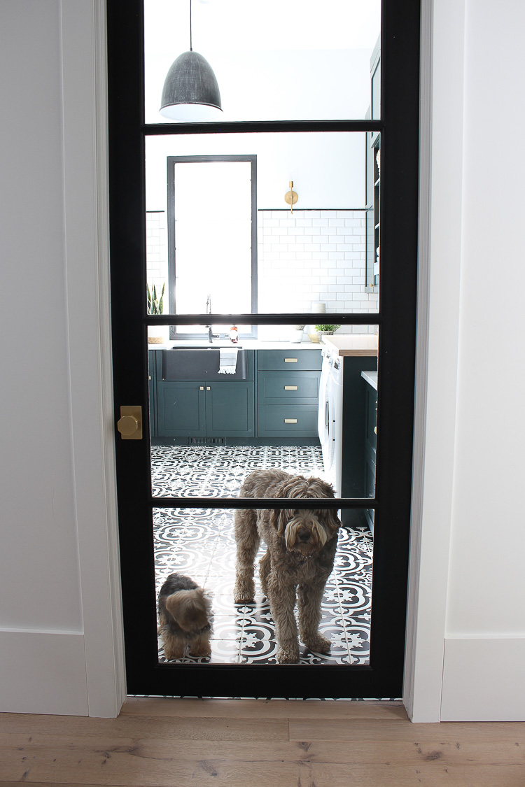 The Laundry/Dog Room: Dark Green Cabinets Layered On Classic Black