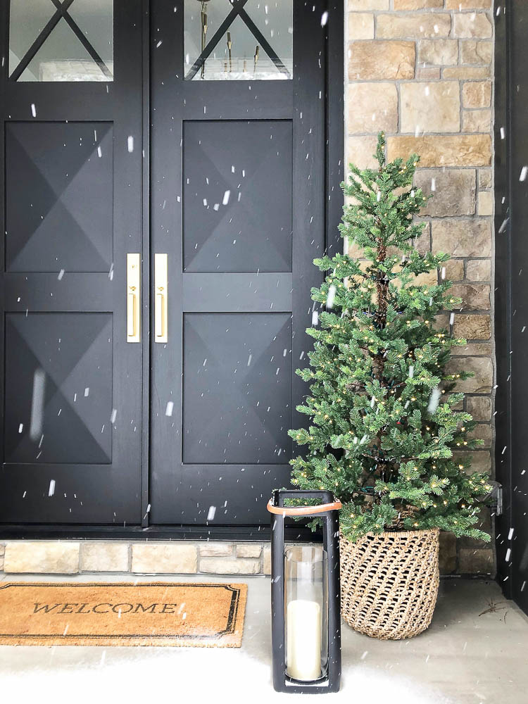 https://thehouseofsilverlining.com/wp-content/uploads/2019/11/the-forest-modern-winter-wonderland-christmas-home-tour-black-stone-exterior-snow-7.jpg